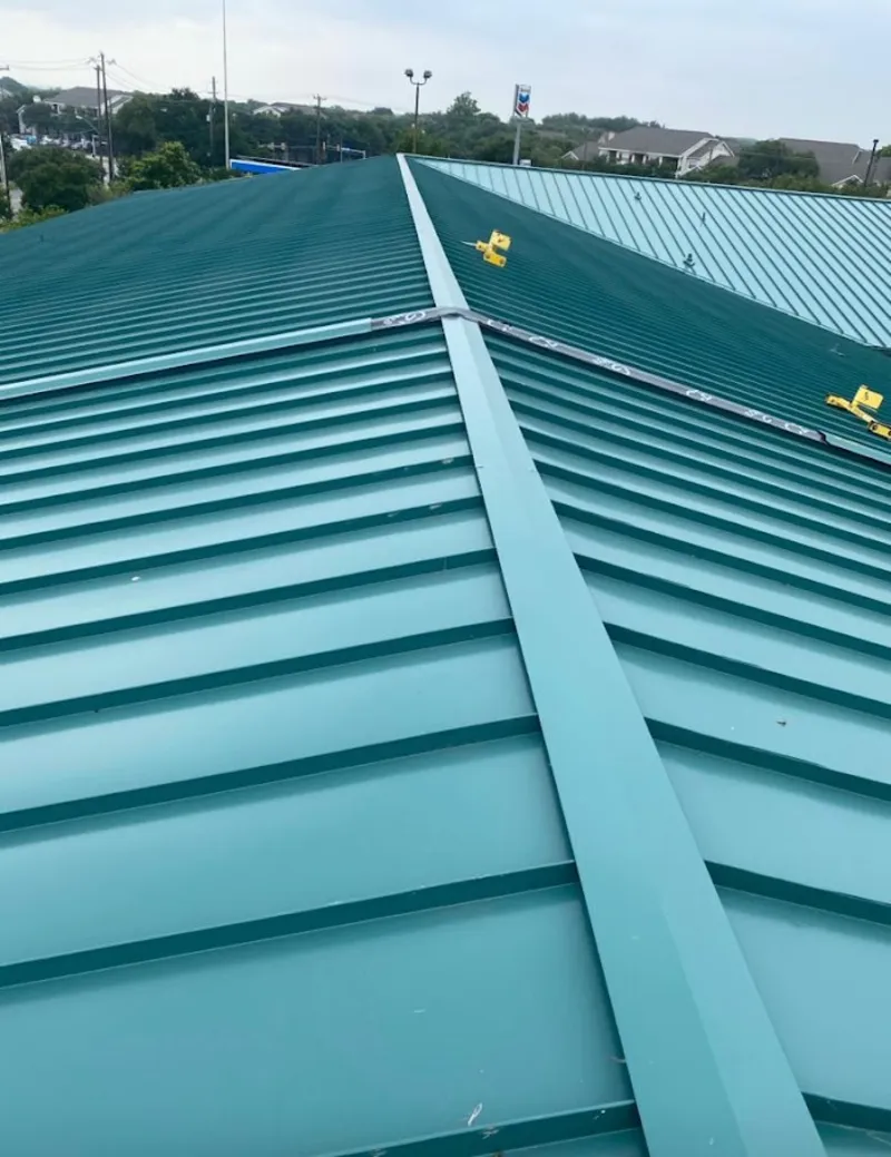Green commercial metal roof ridge and valley for Metal Roof Repair in Monticello
